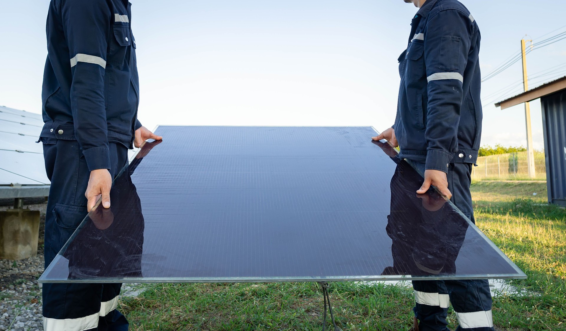 Technician is lifting the solar cell to replace the damaged one, Alternative energy to conserve the world's energy, Photovoltaic module idea for clean energy production